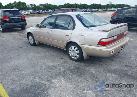 1997 Toyota Corolla Dx z USA, uszkodzony, nr VIN 1NXBB02E9VZ625990